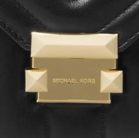 Image showing the enlarged Michael Kors emblem on the Whitney large quilted leather shoulder bag
