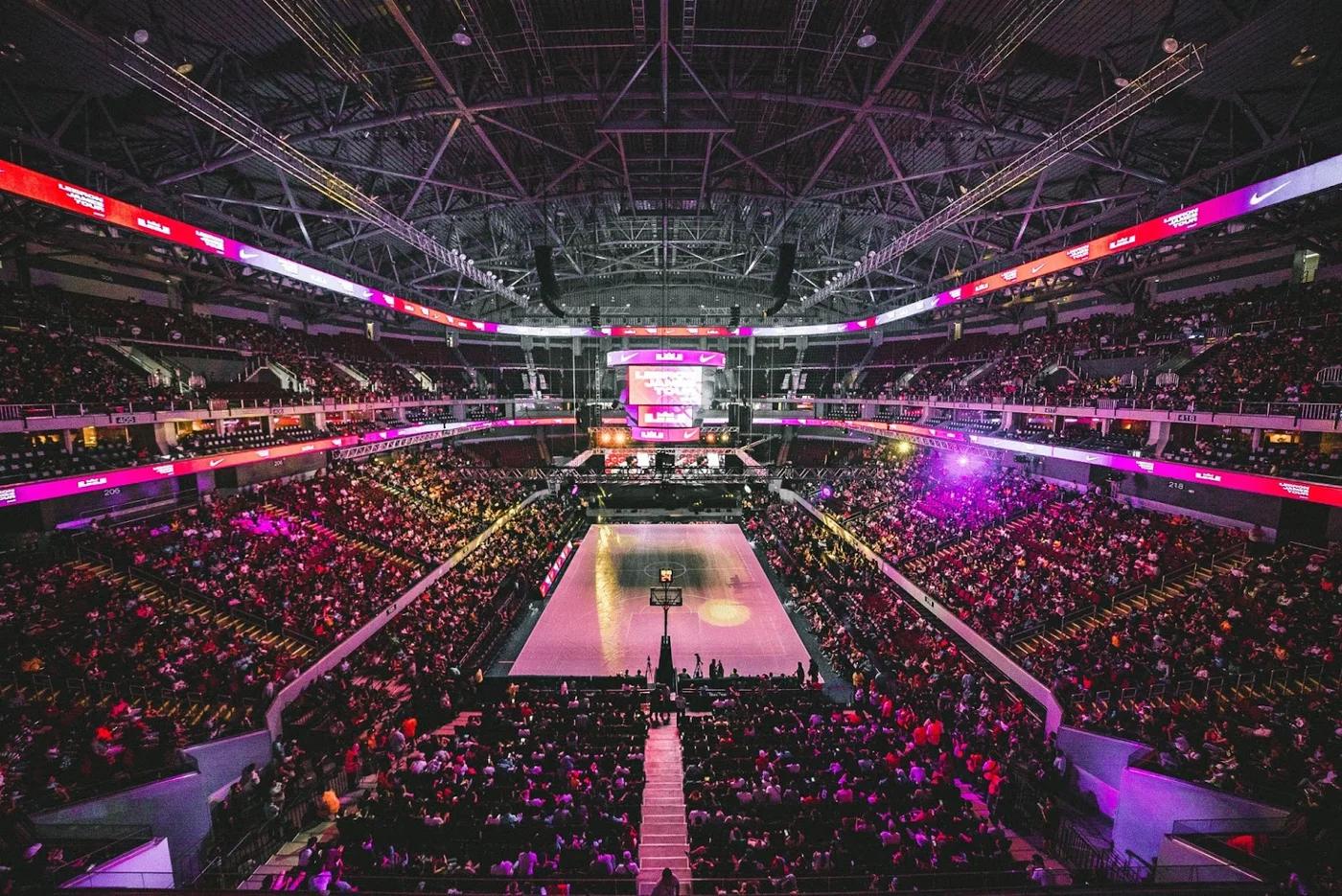 A packed basketball game event.